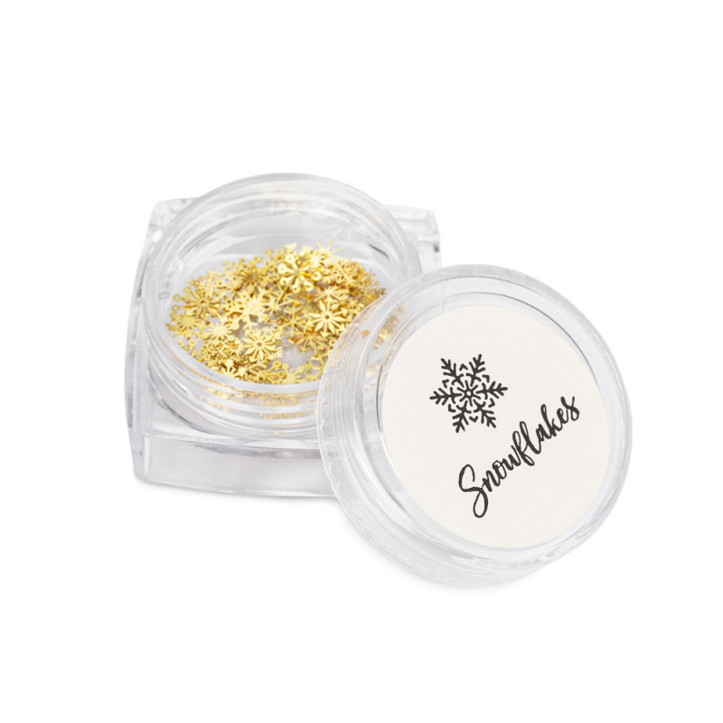 Gyllene snöflingor studs i olika former för nageldesign