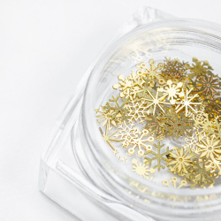 Gyllene snöflingor studs i olika former för nageldesign