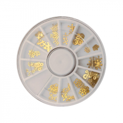 Guldiga studs olika former för nageldesign